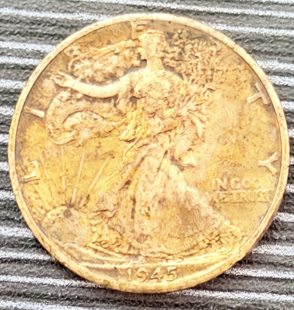 [FC 64] 1945 Walking Liberty Half Dollar (90% silver, Philadelphia Mint – no mint mark visible) VF Coin